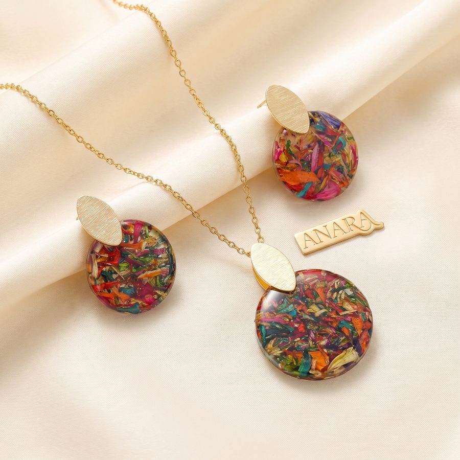 Set Encanto Botánico, aretes y dije en resina
